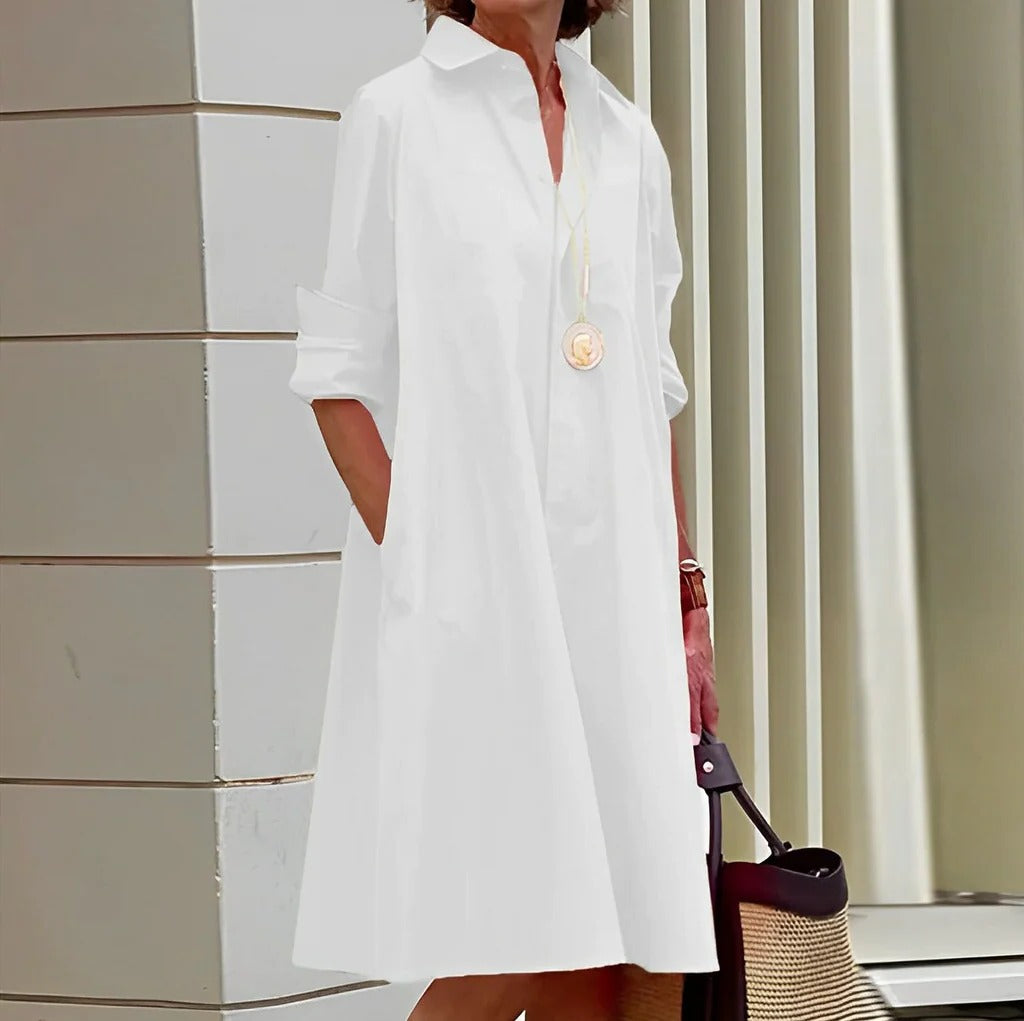 Stylish women's sporty polo dress for casual everyday fashion. Comfortable short-sleeve mini dress with collar.