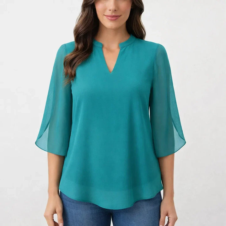 Versatile women's blouse with a relaxed fit, ideal for stylish everyday fashion.