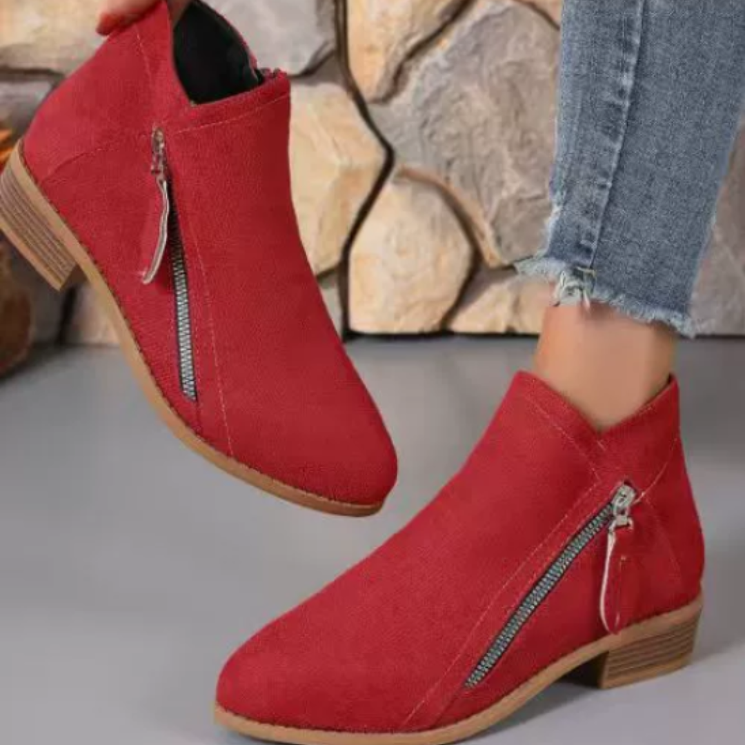 Easy-access zipper on women's comfortable waterproof ankle boots, designed for everyday wear & convenience.