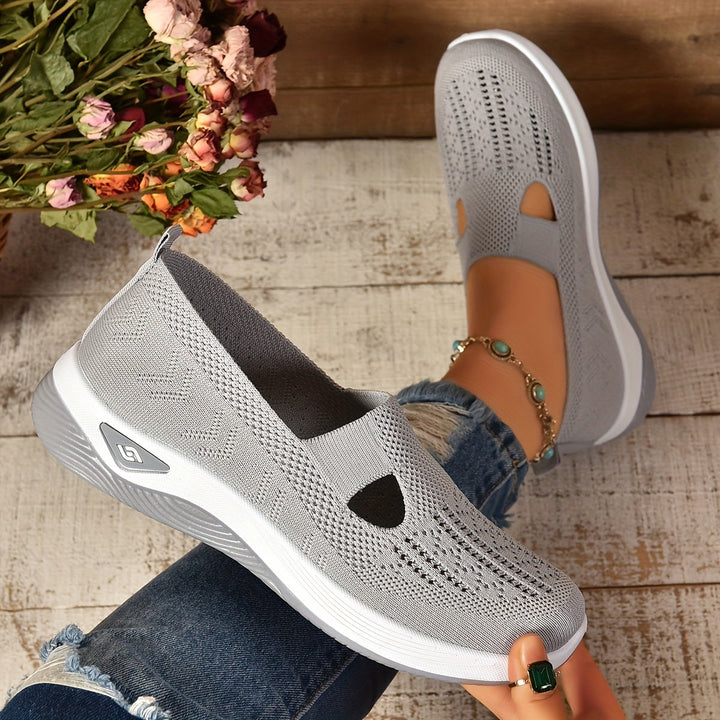 Women's walking shoes with slip-on design, providing essential support & comfort.
