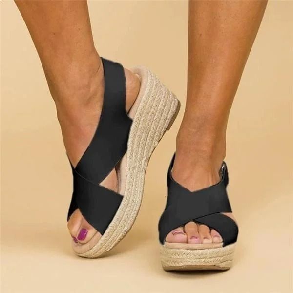 Comfortable women's wedge sandals, ideal for summer walks. Supportive footwear for everyday wear.
