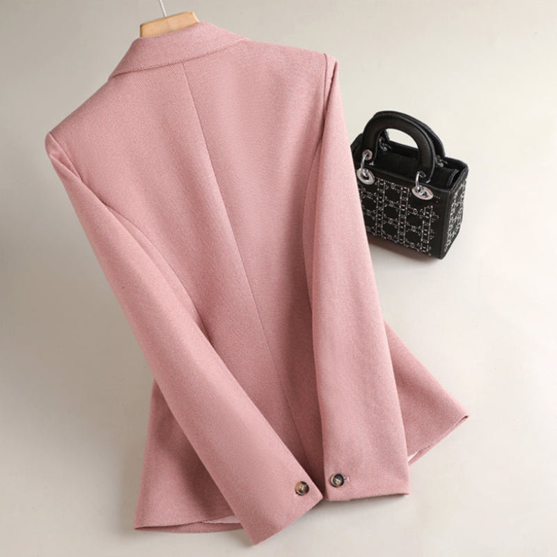Woman in a classic tailored fit blazer jacket, exuding professional style & confidence. Perfect for business & office.