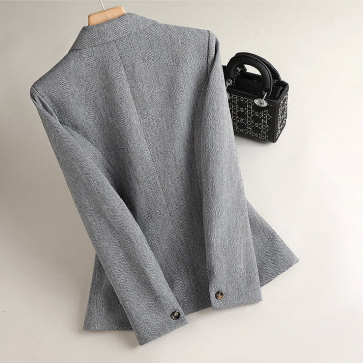 Sophisticated women's tailored blazer, a versatile jacket for modern office attire & smart casual women's fashion.