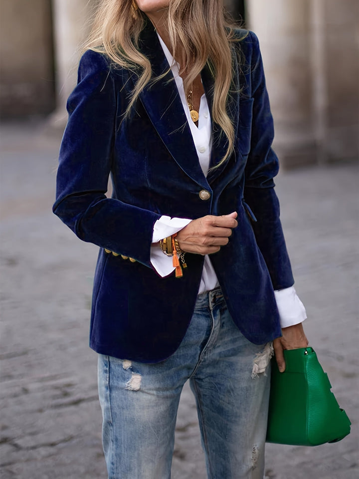 Figure-flattering women's tailored jacket with stylish gold button detailing. A chic formal fashion piece.