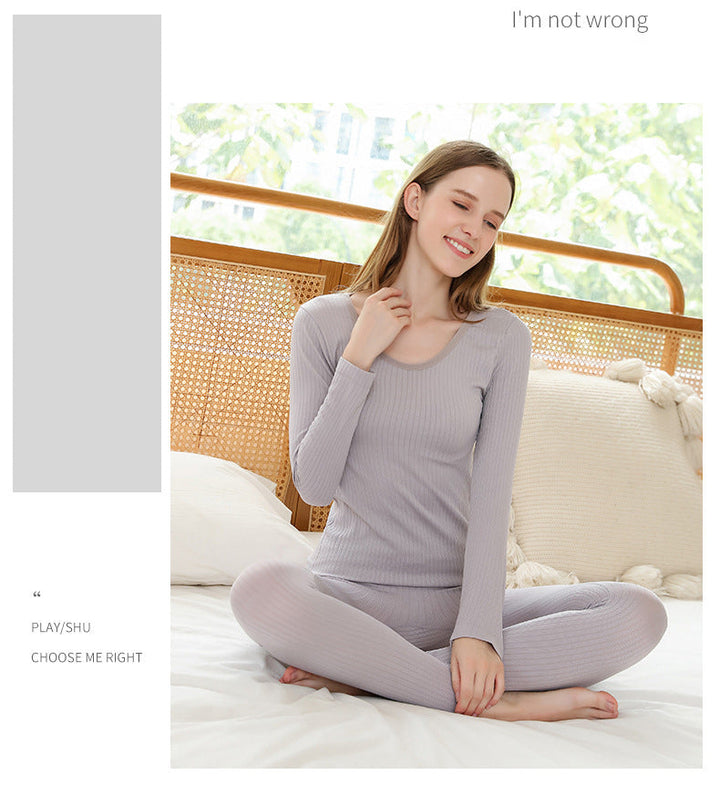 Long sleeve women's thermal top, a cozy base layer for winter activities.