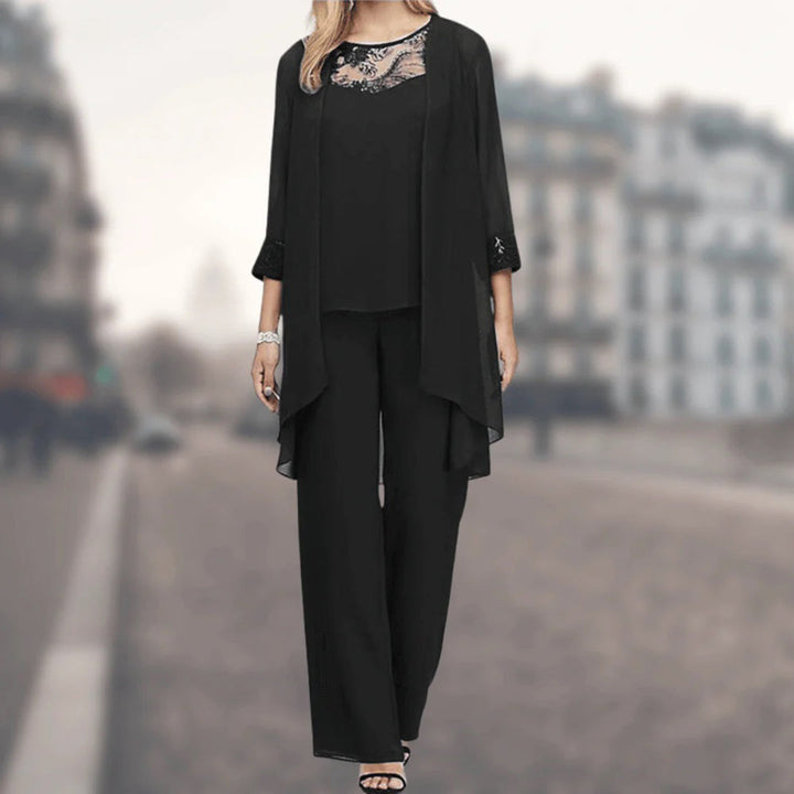 Women's timeless flowy two-piece outfit set, ideal for elegant casual wear. Comfortable wide-leg pants & matching top.