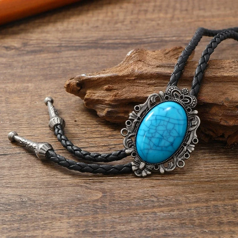 Tribal women's bolo tie with polished onyx stone pendant on a genuine leather cord.