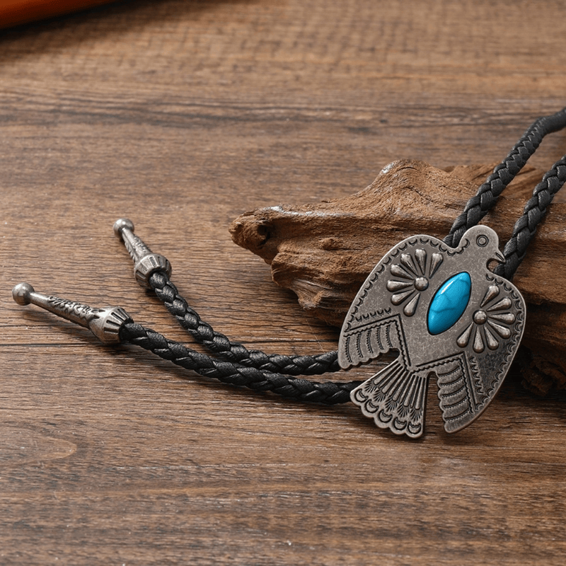 Women's bolo tie with a striking turquoise-colored stone & braided leather cord.