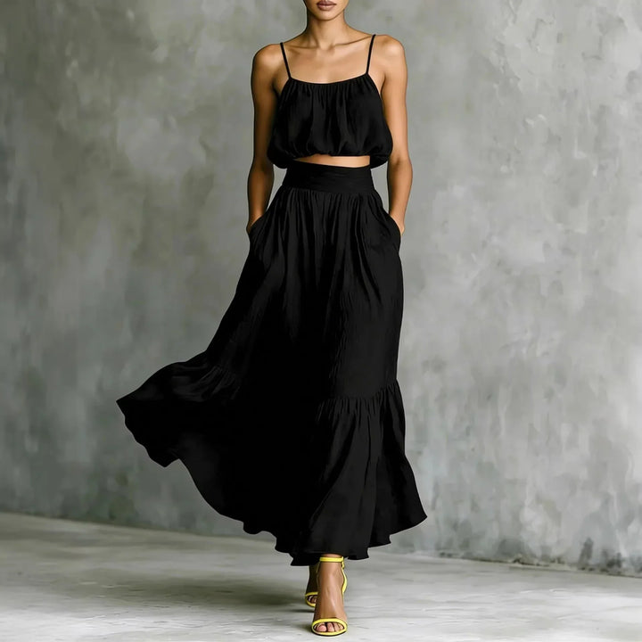 Comfortable women's crop top and flowy maxi skirt set with ruffle hem, excellent beach wear for vacation outfits.
