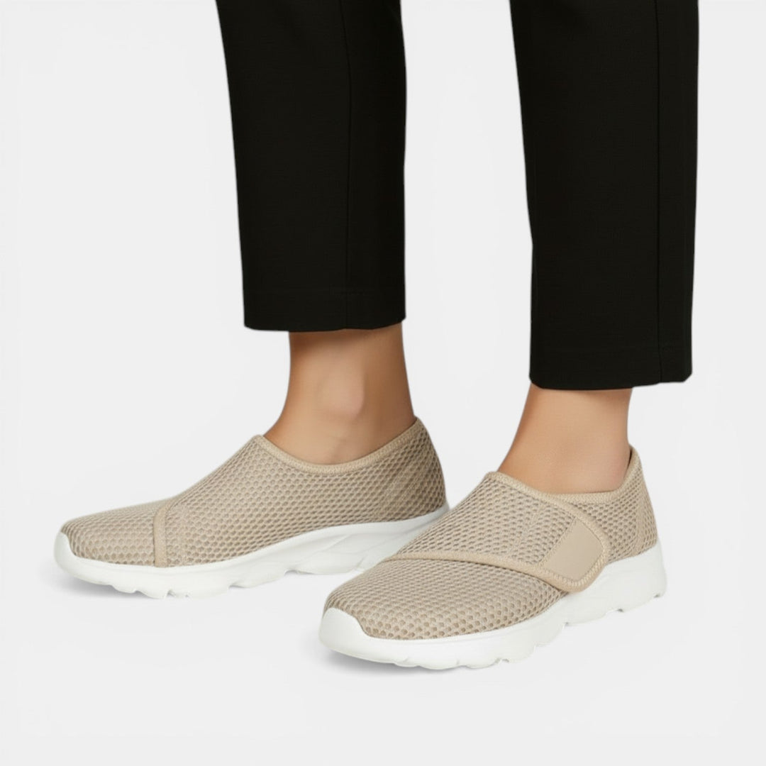 Breathable athletic walking sneakers for women. Ultra-light design ensures all-day comfort & support.