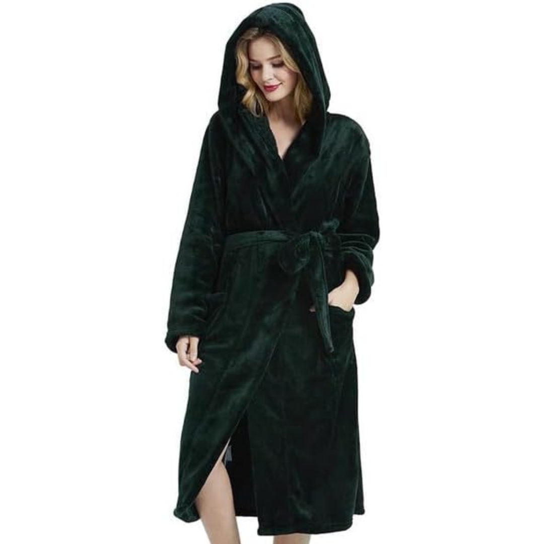 Woman enjoying cozy comfort in a plush, full-length hooded bathrobe. Perfect relaxation loungewear.