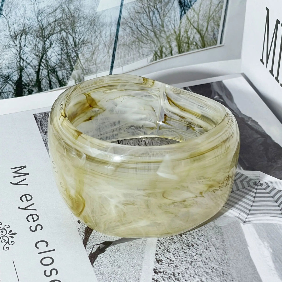 Beautiful women's irregular marble-patterned acrylic bangle. A unique and fashionable jewelry gift for women.