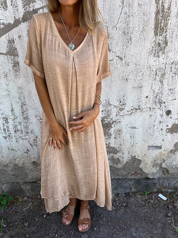 Women's V-neck loose fit midi dress, perfect for relaxed everyday wear & summer comfort.