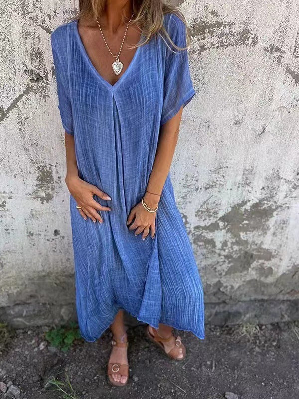 Stylish V-neck midi dress for women, offering versatile casual elegance & flowy comfort.