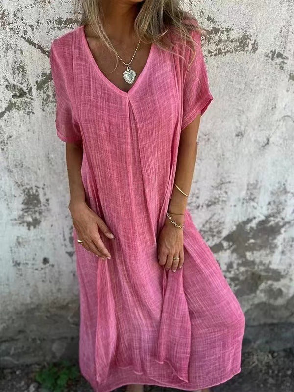 Women's versatile V-neck midi dress in a loose, flowy fit. Perfect for summer fashion & casual elegance.