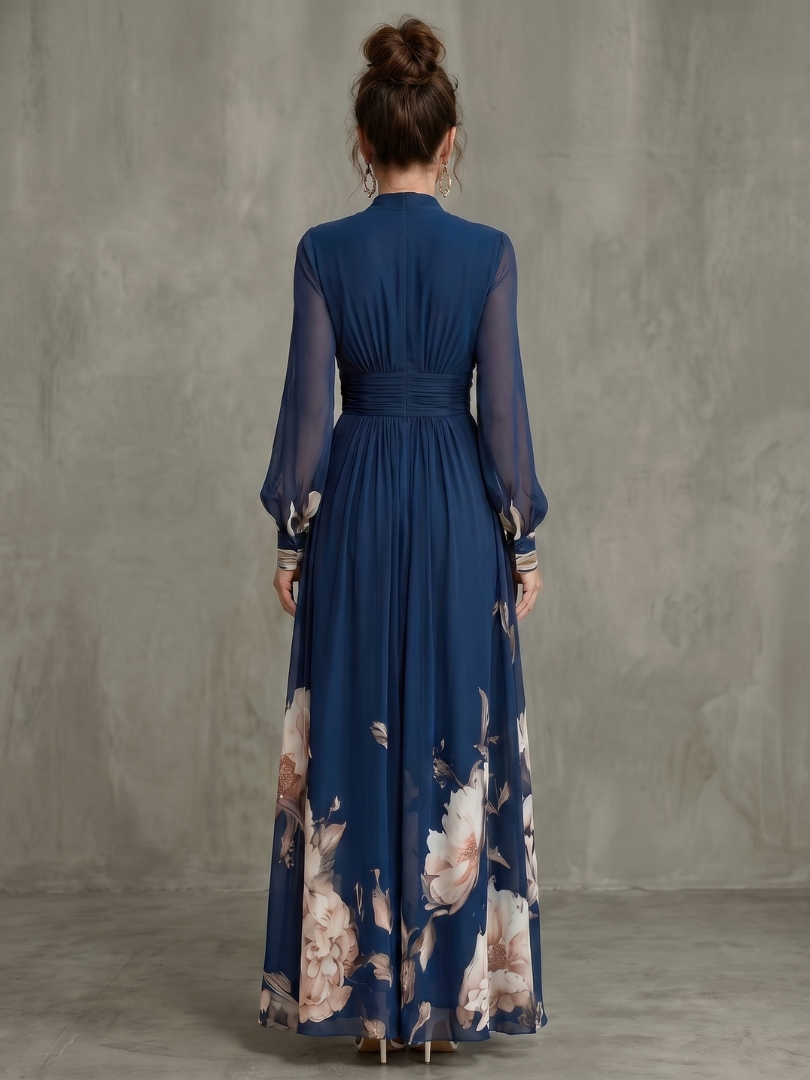 Flowy women's V-neck maxi dress with elegant sheer long sleeves & pleated detail. Ideal for formal or casual.