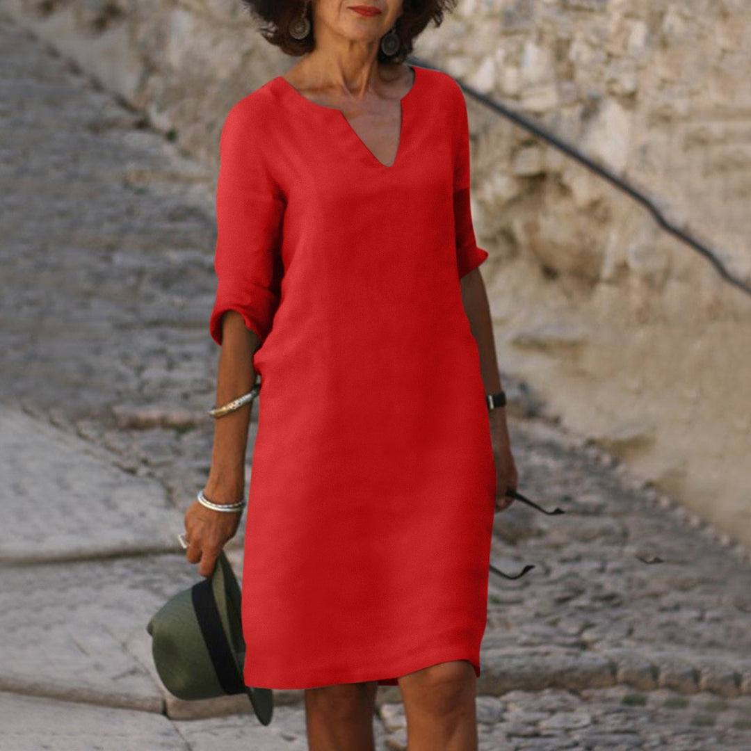 Breathable fabric women's V-neck relaxed fit midi dress, ultimate comfort for long summer days.