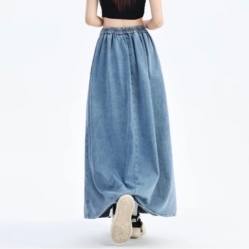 Chic & comfortable women's blue denim midi skirt, high-waisted for versatile summer fashion.