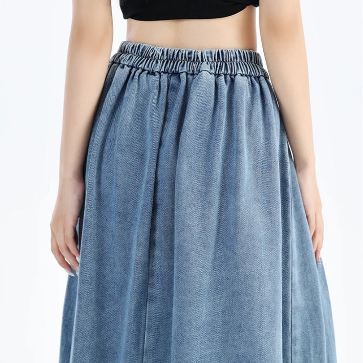 High-waisted blue denim midi skirt for women, comfortable and chic for versatile summer fashion.