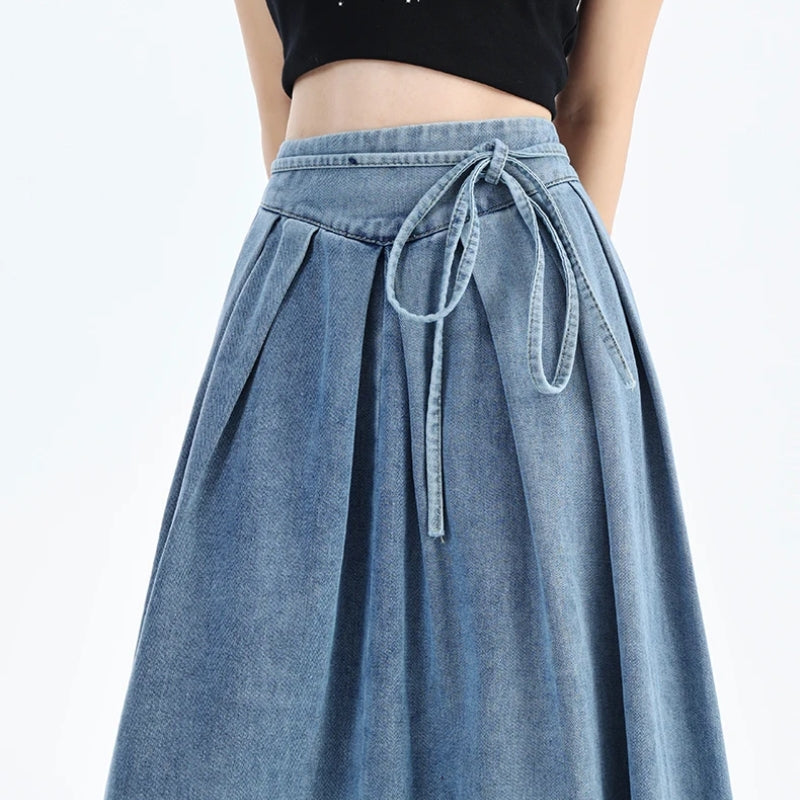 Women's comfortable high-waisted denim midi skirt, a versatile blue skirt for casual summer fashion.