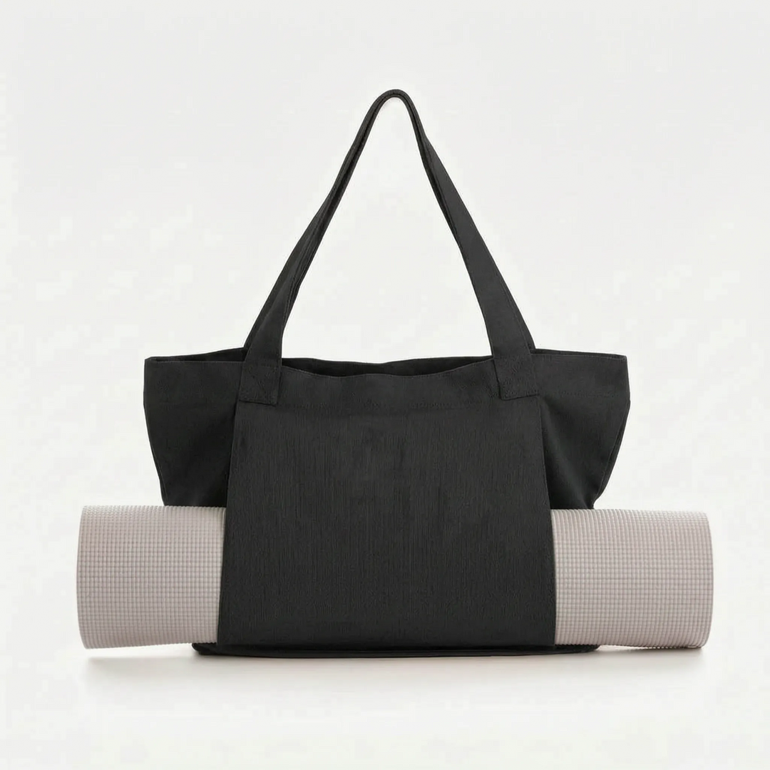 Versatile women's mat bag. Perfect canvas tote for yoga, fitness, gym, and everyday essentials. Comfortable shoulder strap.
