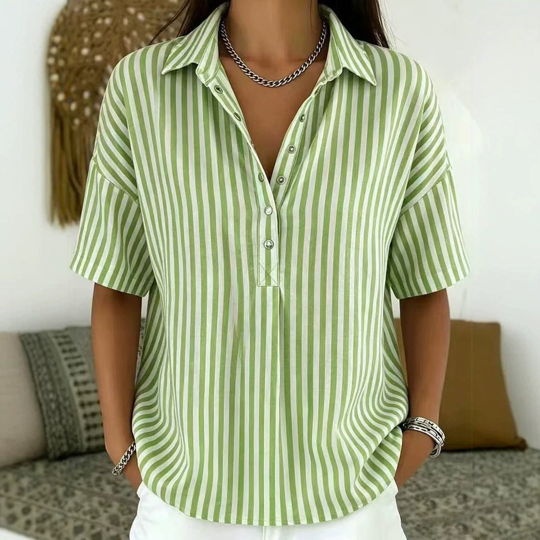 Elegant women's vertical stripe blouse, short sleeve, half-button. Versatile striped shirt for spring summer fashion.