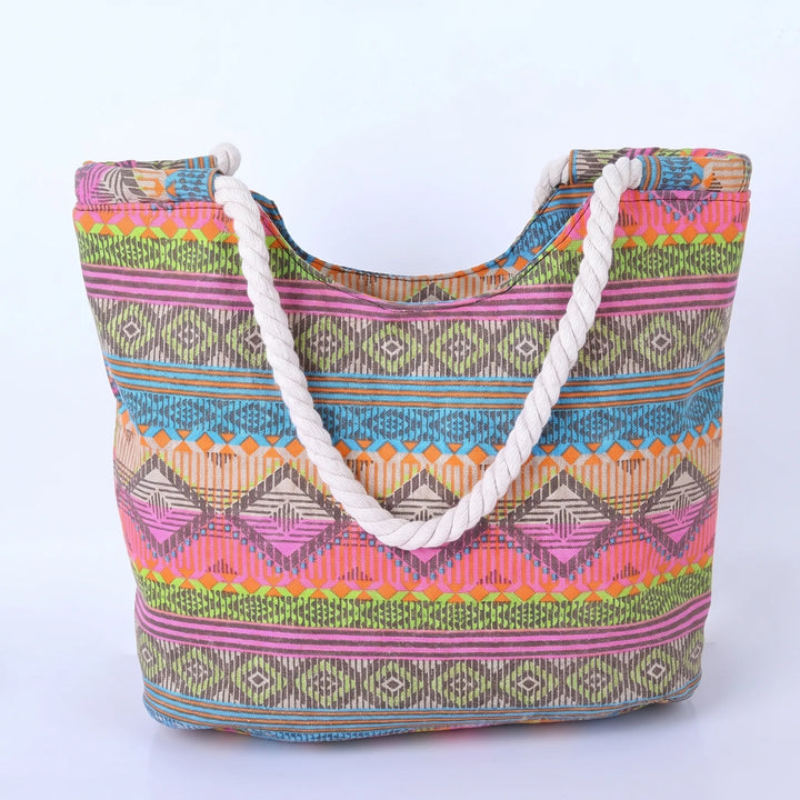 Trendy women's patterned tote bag with a vibrant geometric print, ideal for casual and summer fashion.