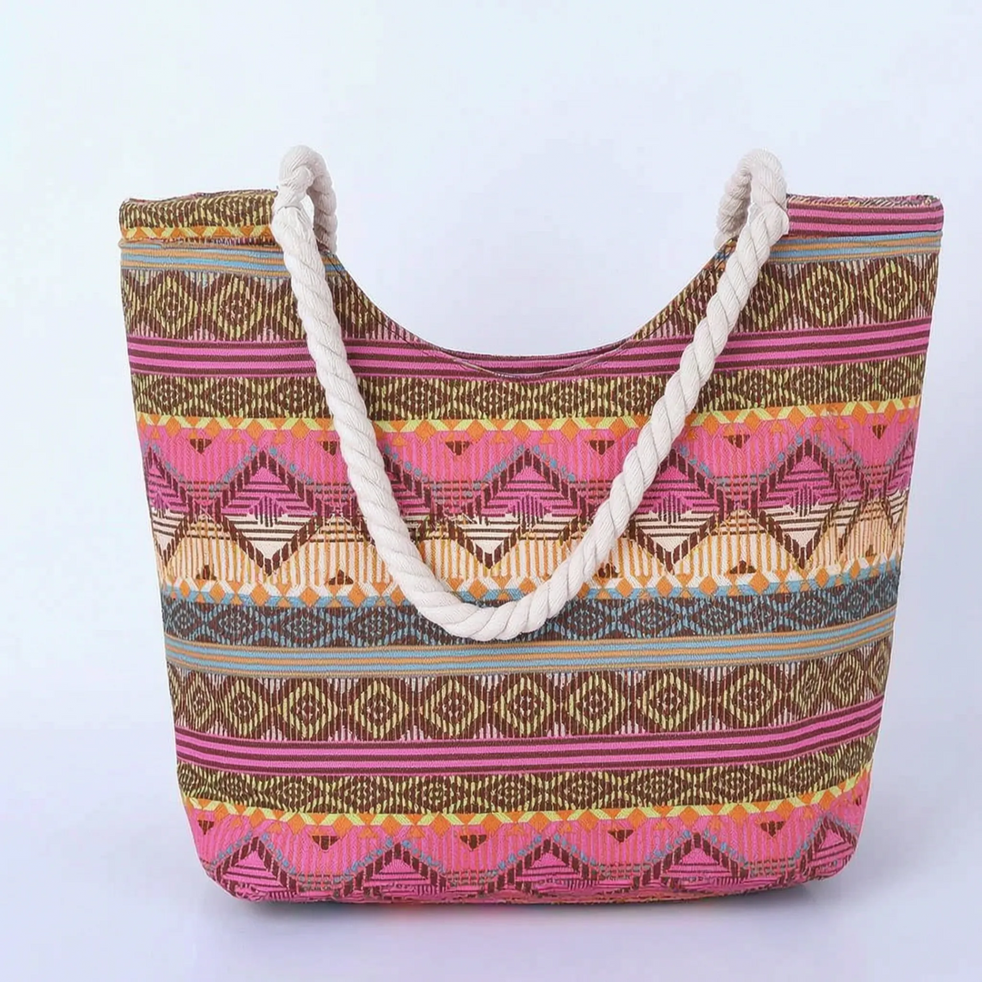 Versatile women's casual shoulder tote bag with a unique patterned design, great for daily errands or beach trips.