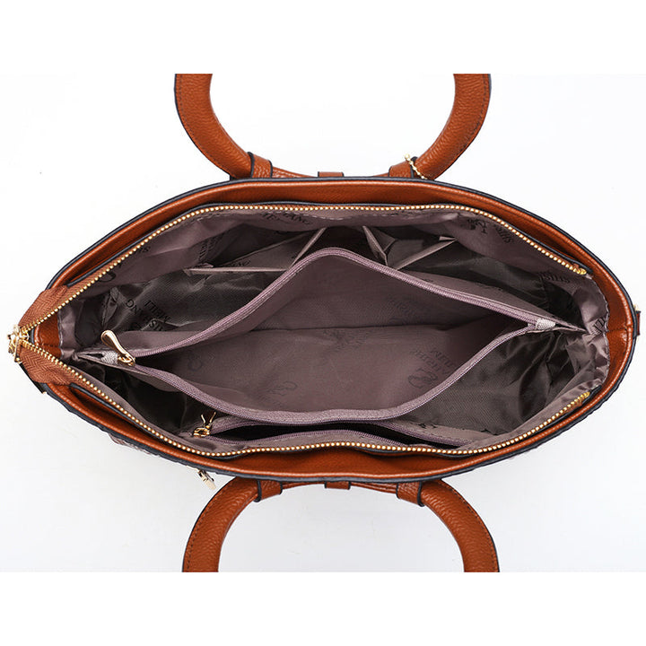 Elegant women's handbag featuring classic alligator-embossed design and round handle.