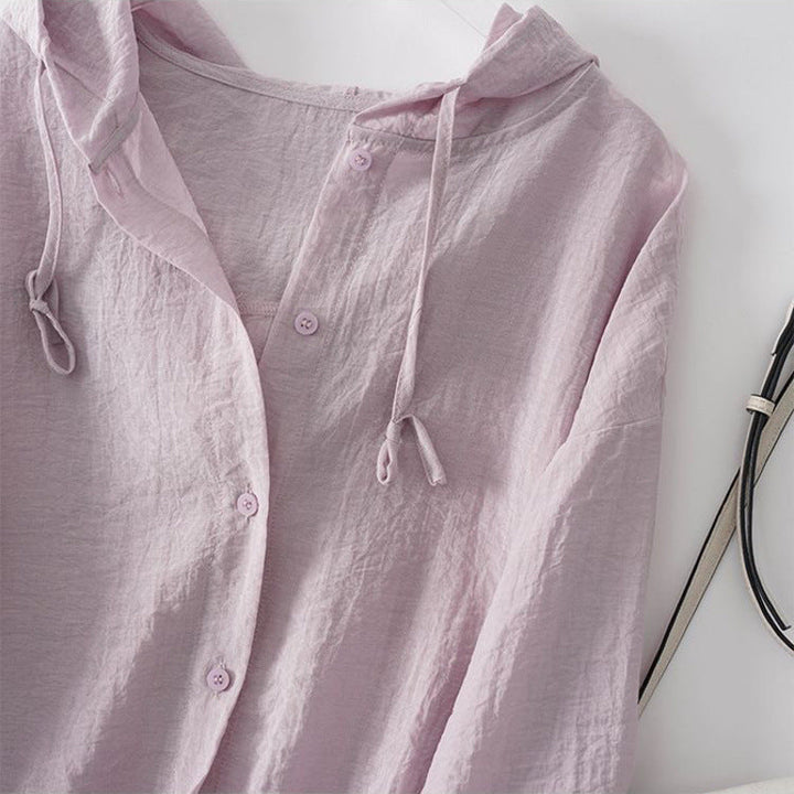 Stylish women's violet casual drawstring hoodie, relaxed fit top. Essential lightweight hooded wear for spring fashion.