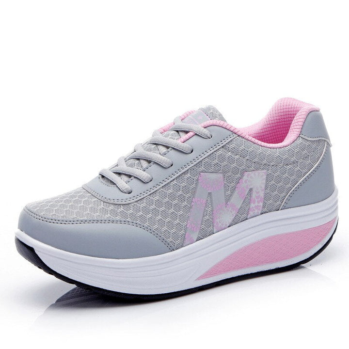 Athletic women's walking shoes offering supportive comfort, breathable lightweight design for an active lifestyle.