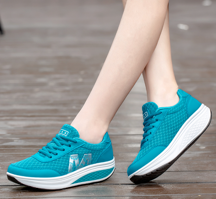 Stylish women's walking sneakers with supportive cushioning and a breathable upper, great for casual daily activities.
