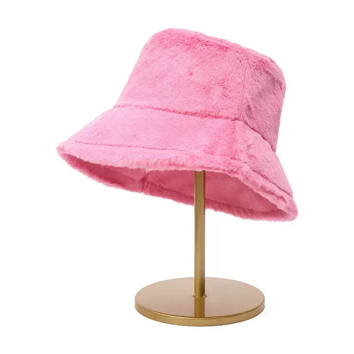 Ladies' plush bucket hat with faux rabbit fur. Essential warm headwear for cold weather protection.