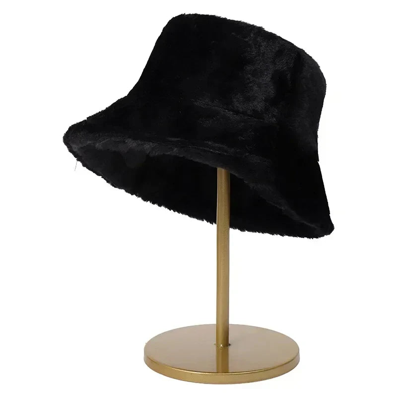 Cozy women's winter bucket hat made from luxurious faux rabbit fur. Perfect for cold weather.