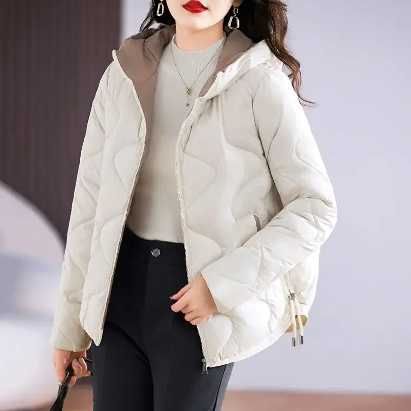 Casual women's quilted puffer jacket. Everyday warm winter outerwear, combining style & comfort.