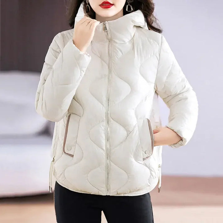 Chic women's quilted puffer jacket, a warm winter outerwear essential for fashion-conscious women.