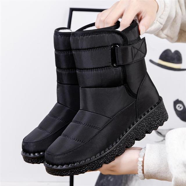 Durable women's waterproof snow boots with warm padding, ideal for icy and cold conditions.