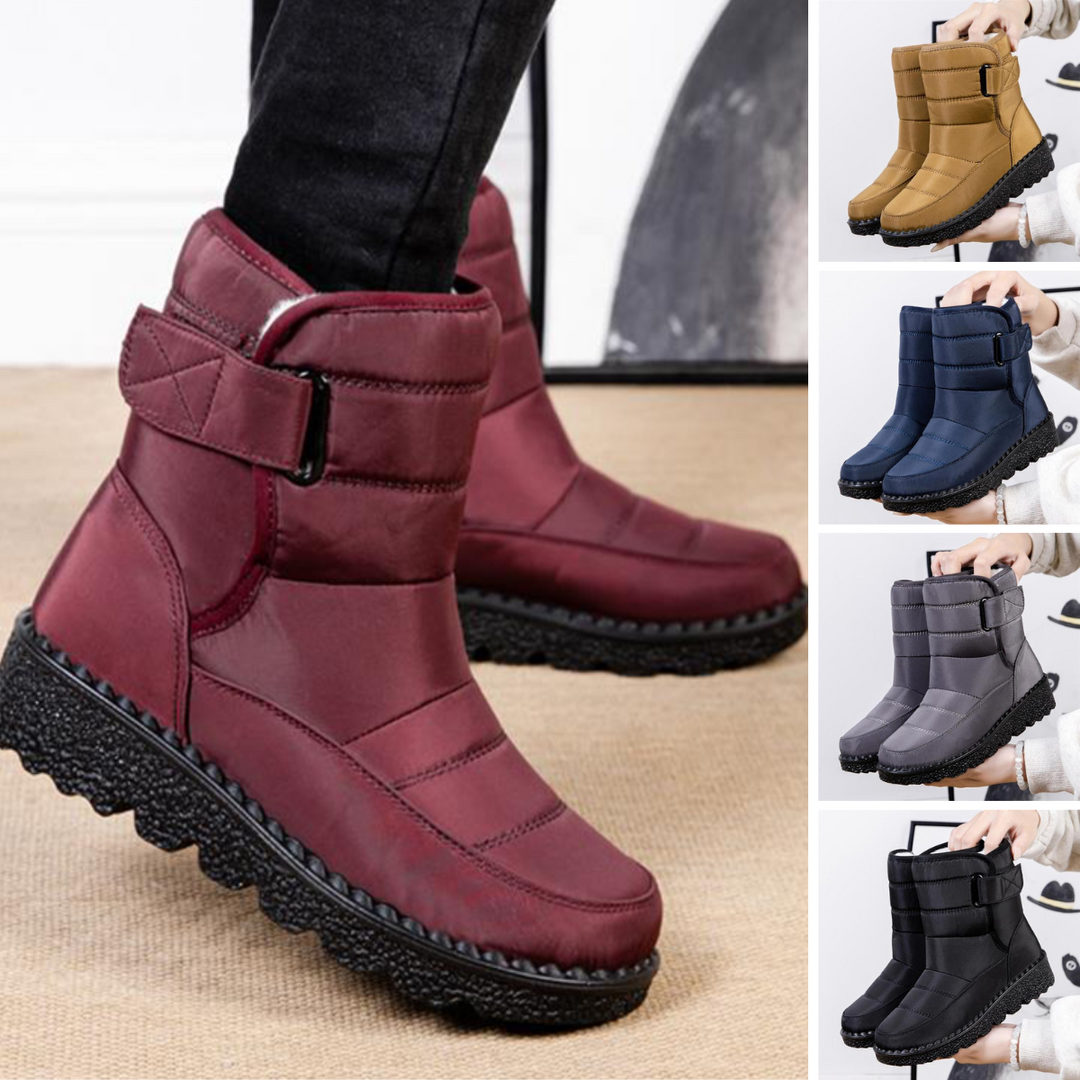 Comfortable padded women's cold weather boots, waterproof to keep feet dry and warm.