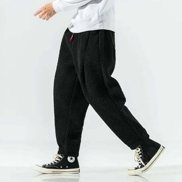 Stylish women's warm casual pants, featuring a relaxed fit for cozy winter comfort and everyday wear.