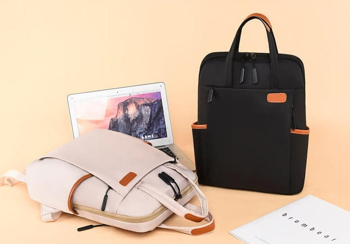 Women's water-resistant anti-theft backpack for laptop & essentials, perfect for work or school.
