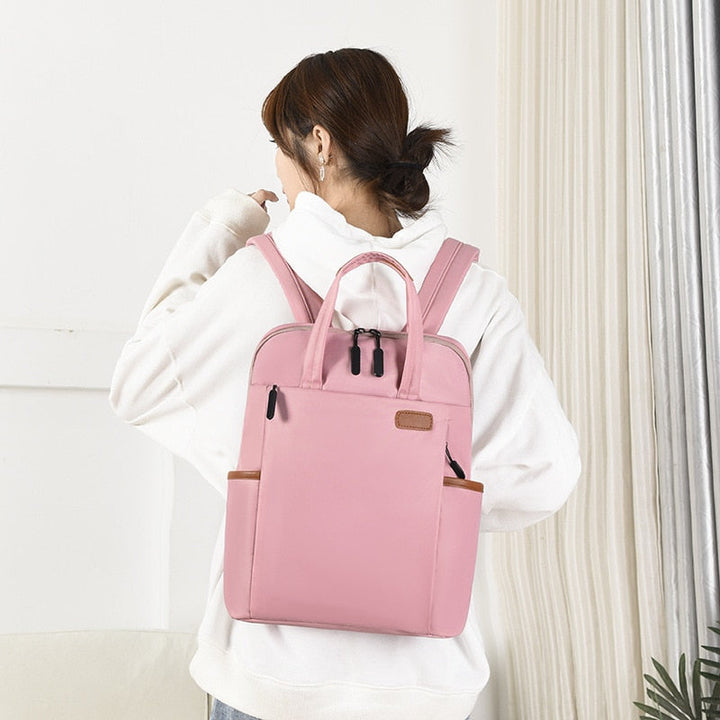 Women's commuter anti-theft backpack, water-resistant & stylish for daily essentials & laptop.