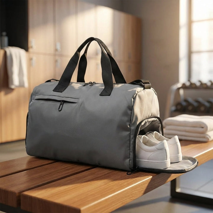 Women's waterproof nylon duffel bag with shoe compartment. Ideal gym, sports, and travel weekend bag.