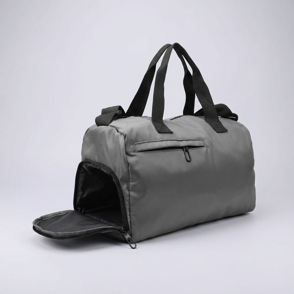 Stylish women's duffel bag with ventilated shoe compartment. Perfect for gym, travel, or a sports weekend.
