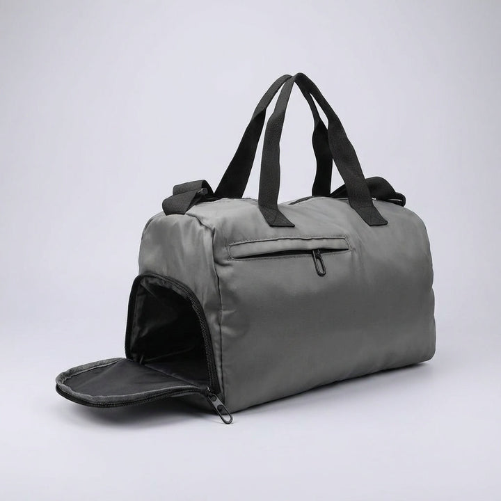 Stylish women's duffel bag with ventilated shoe compartment. Perfect for gym, travel, or a sports weekend.