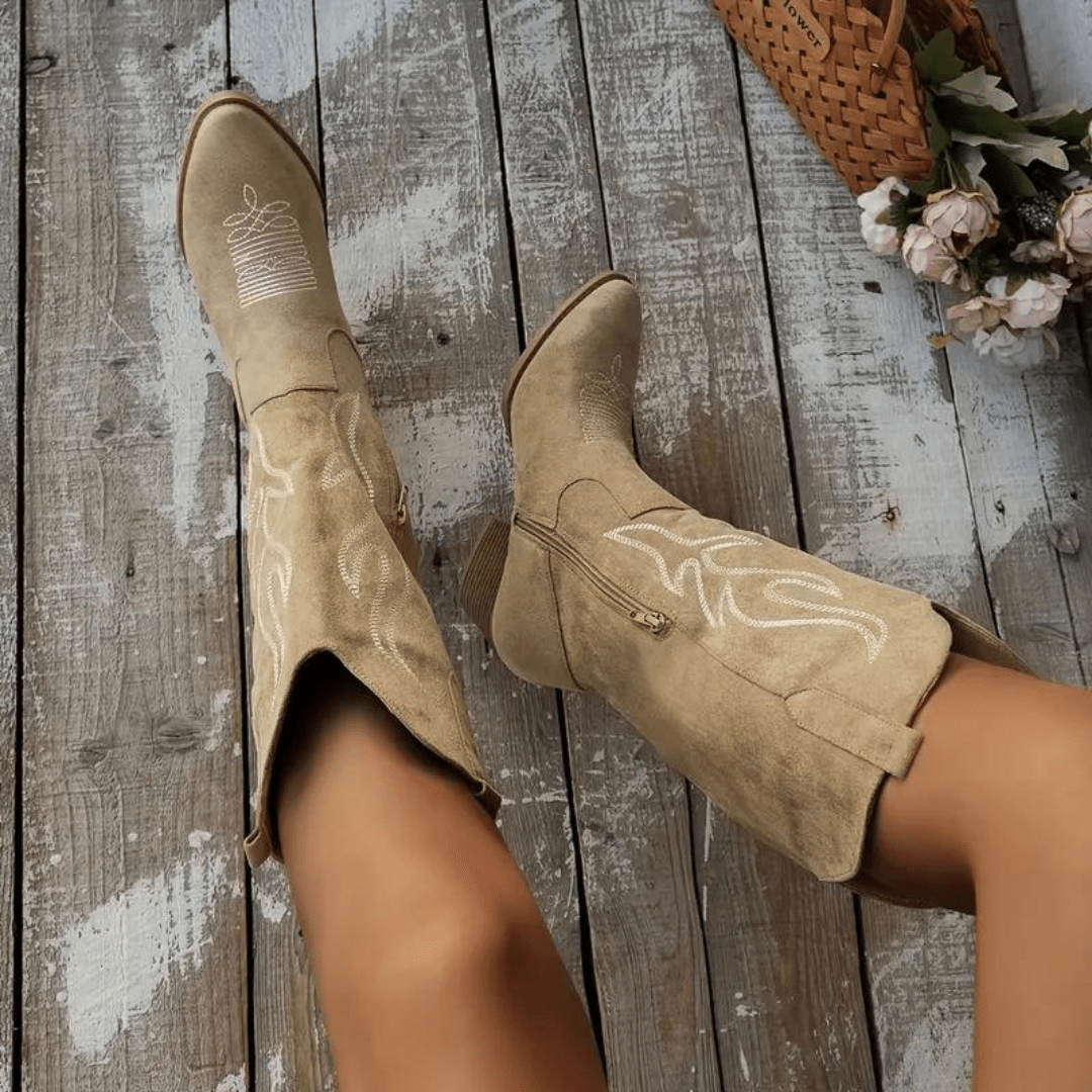 Women's Western cowboy boots with side zipper, pointed toe, embroidered details, and a comfortable block heel.
