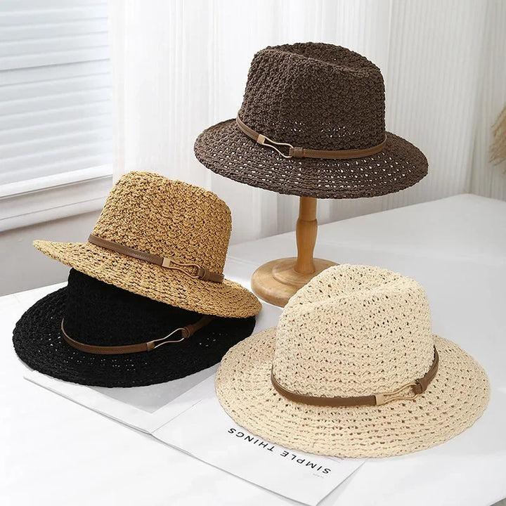 Faux leather band details this women's stylish woven fedora sun hat, featuring a wide brim for summer.