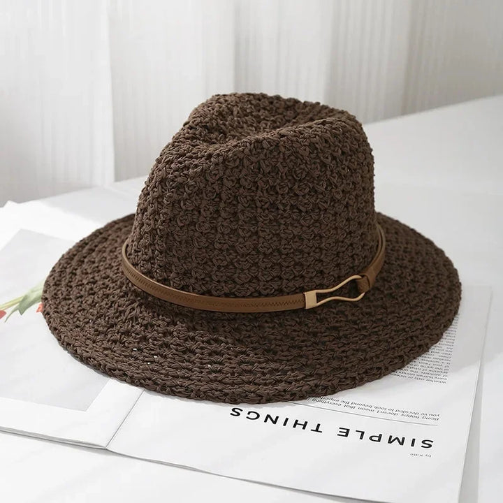 Trendy women's fashion hat: a woven fedora sun style with a chic faux leather band, ideal for summer.