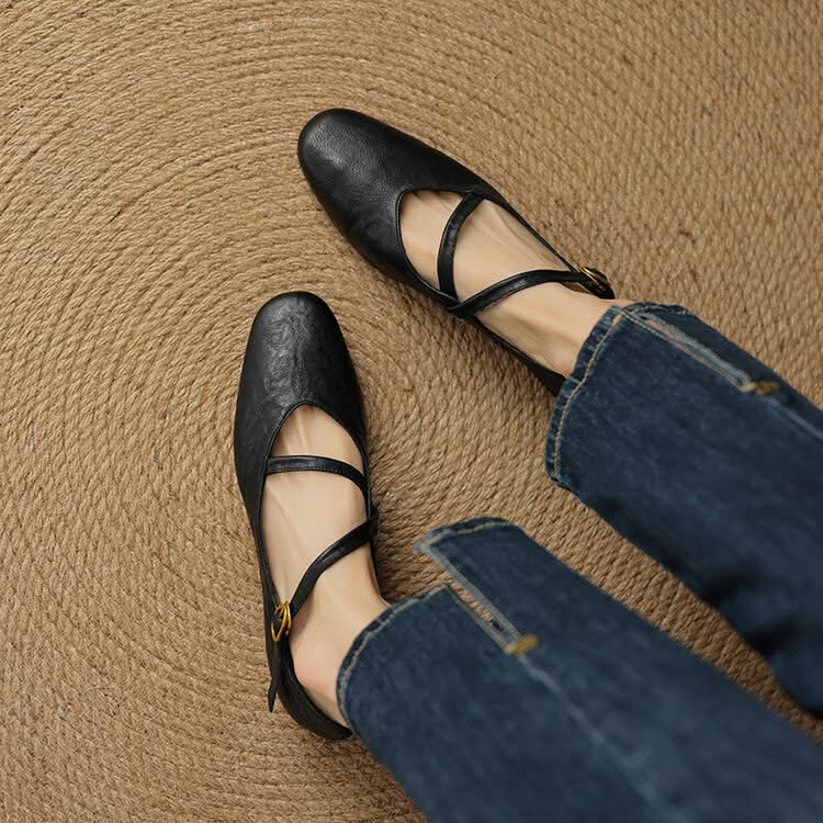 Womens comfortable everyday flats with a classic closed-toe design, featuring a supportive adjustable strap.