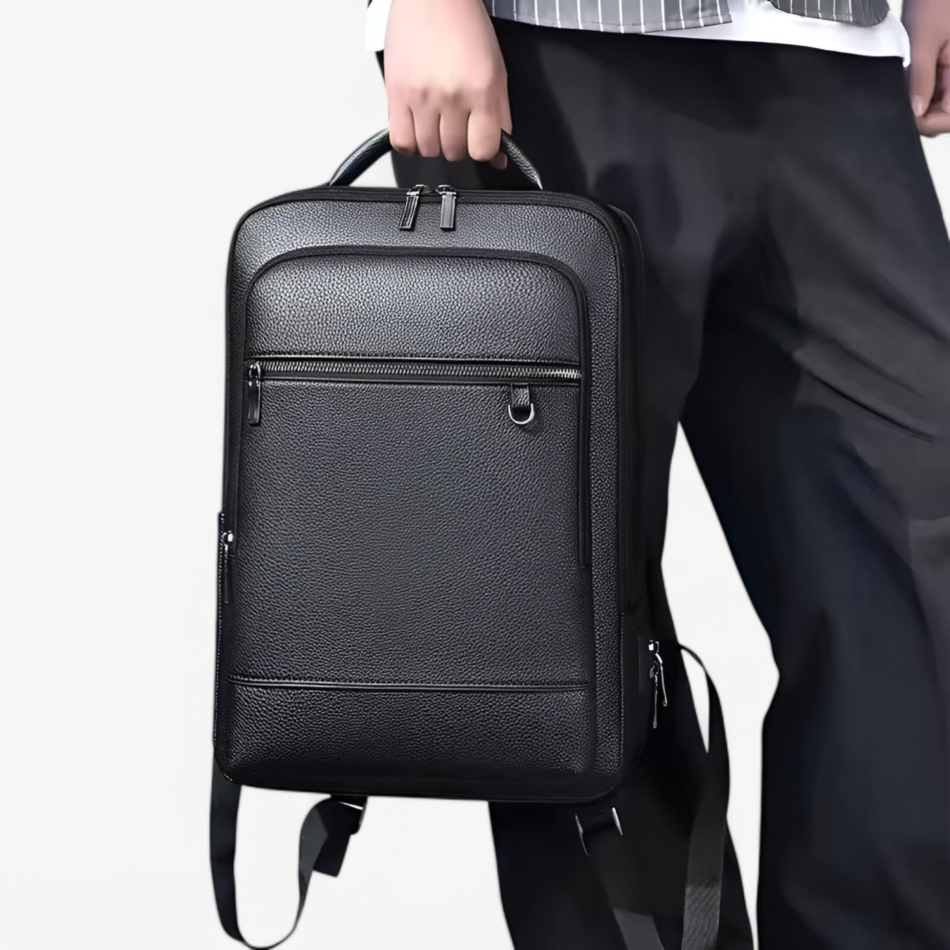 "Zaino in pelle elegante con porta USB, colore nero, design moderno, ideale per lavoro e viaggi. Praticità e stile unite."