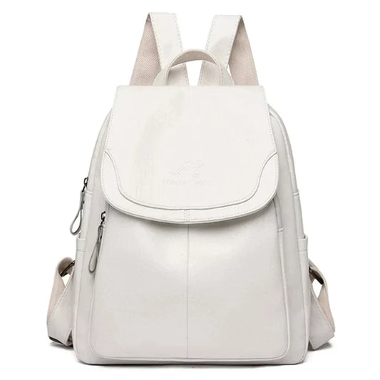 "Zaino in pelle marrone elegante e spazioso con chiusura a cerniera, ideale per donna moderna e multifunzionale."
